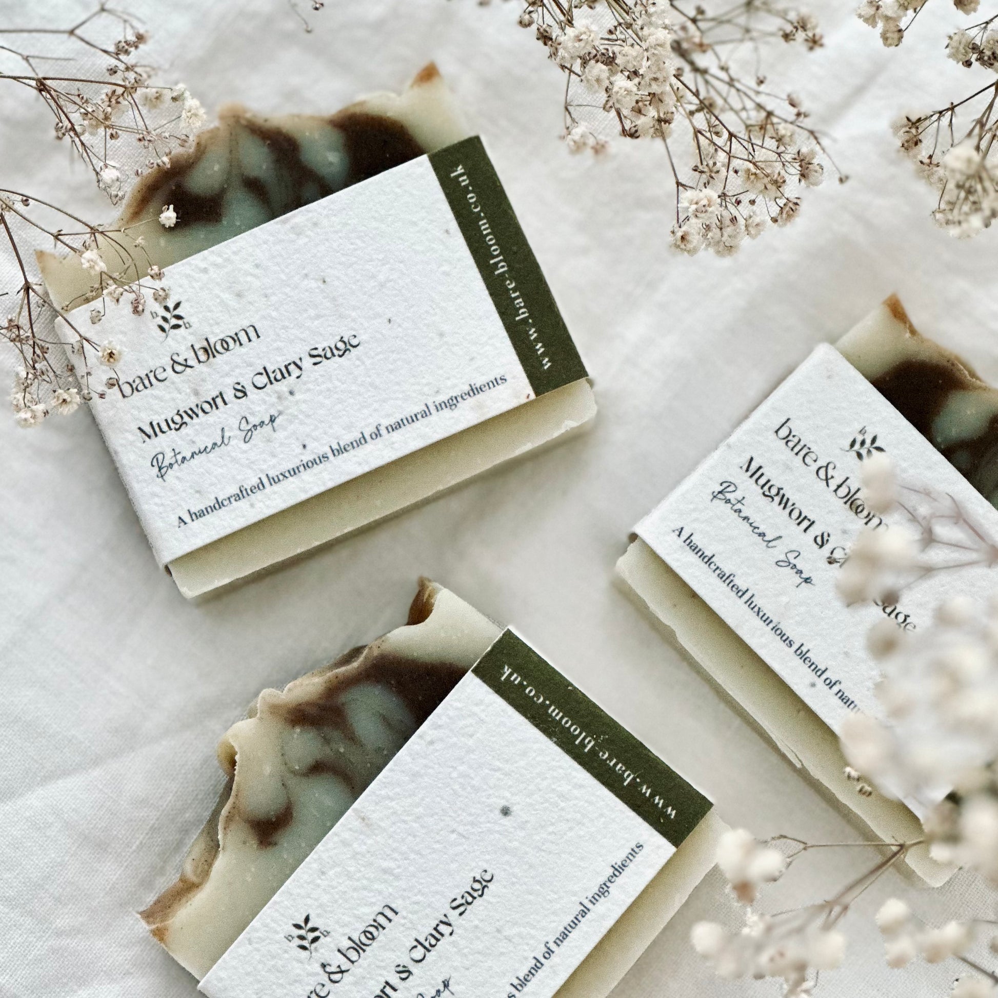 Natural artisan soap wrapped in seeded paper labels