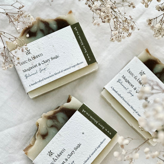 Natural artisan soap wrapped in seeded paper labels