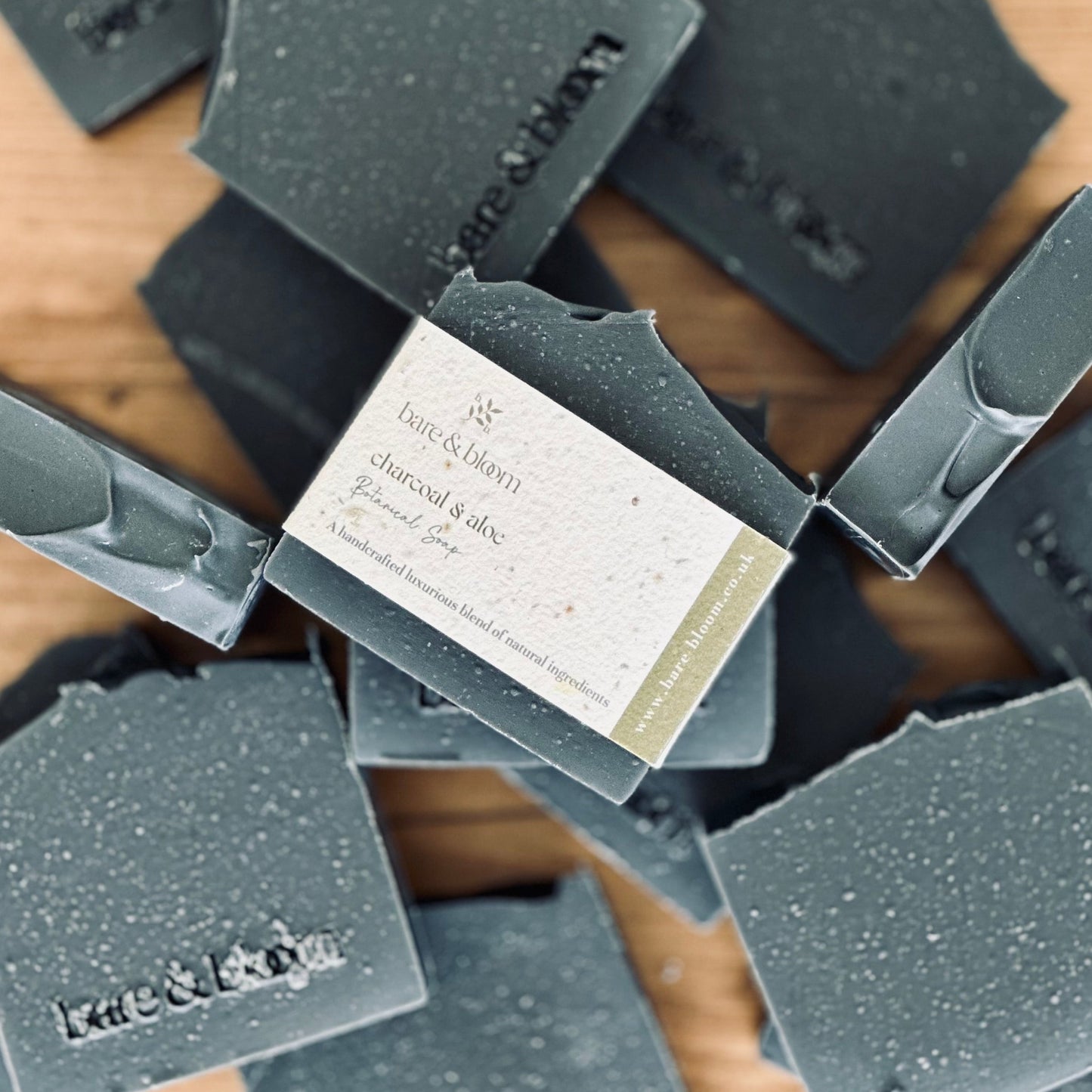 charcoal soap with seeded paper label